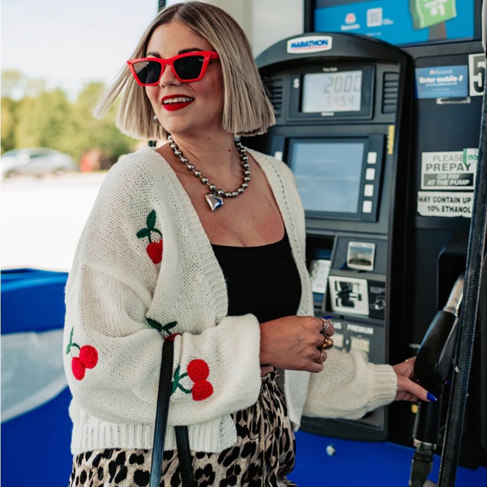 White cardigan with cherry details from Alora Eden Boutique